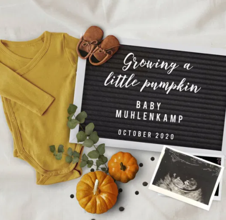 Fall festival themed letter board for a pregnancy announcement  