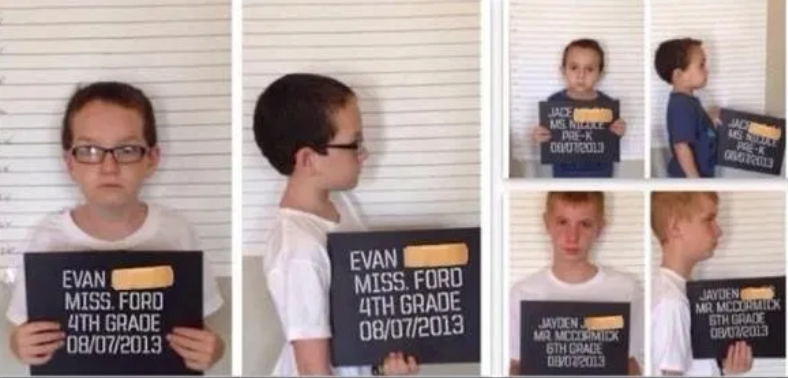 kids posing like they're in jail with signs for the first day of school